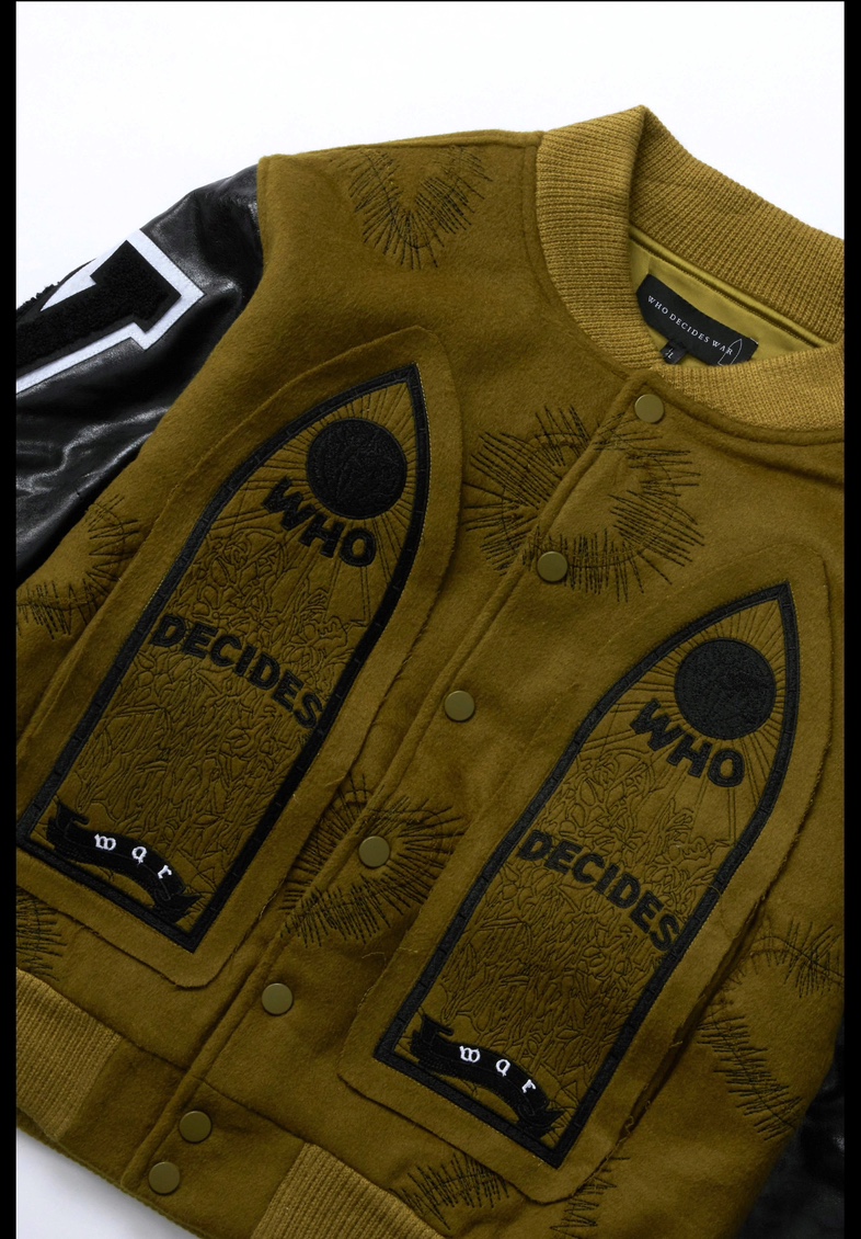 WHO DECIDES WAR Namesake Varsity Olive Jacket