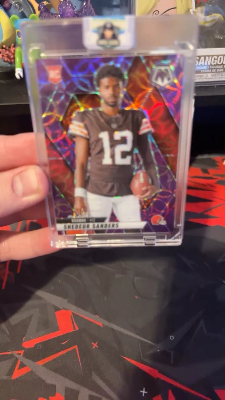 2023 Donruss Optic Mosaic Prizm RC #100 Shedeur Sanders purple scope Cleveland Browns