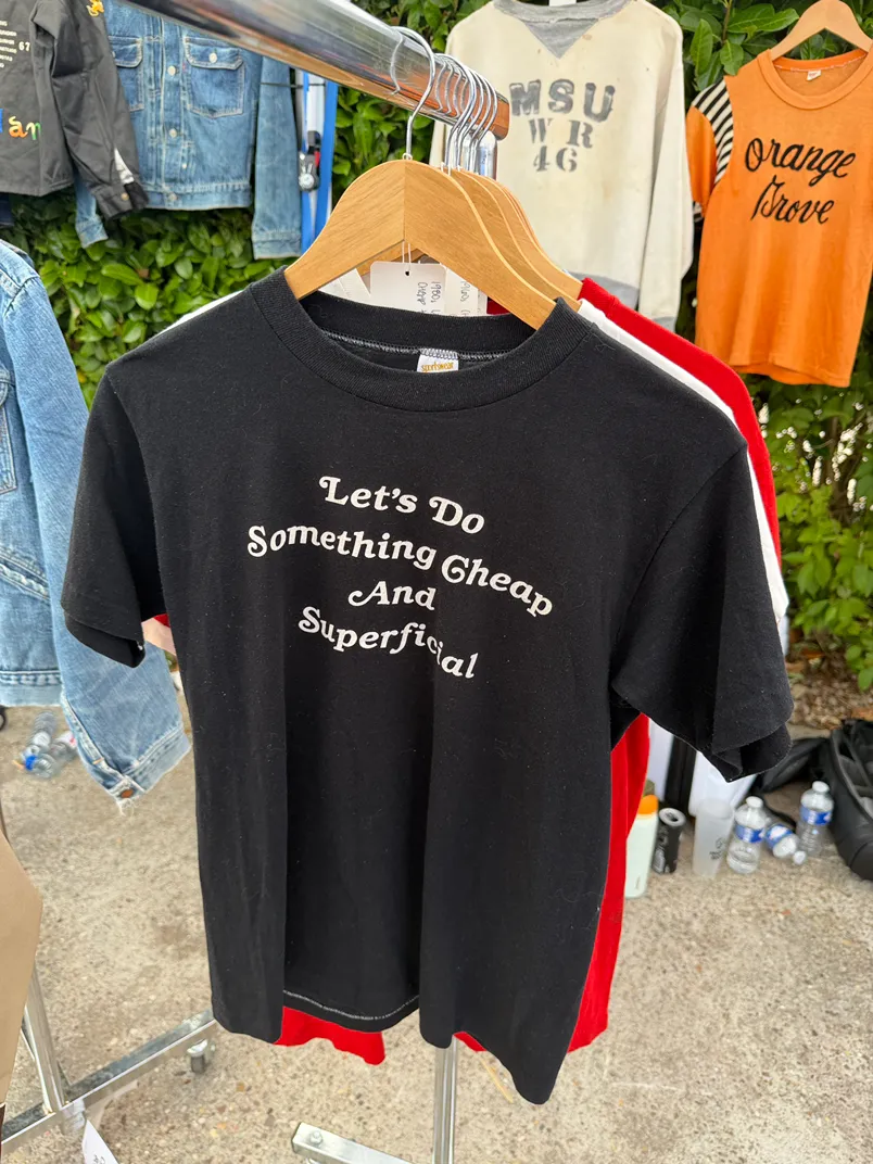 1980s cheap and superficial black tee