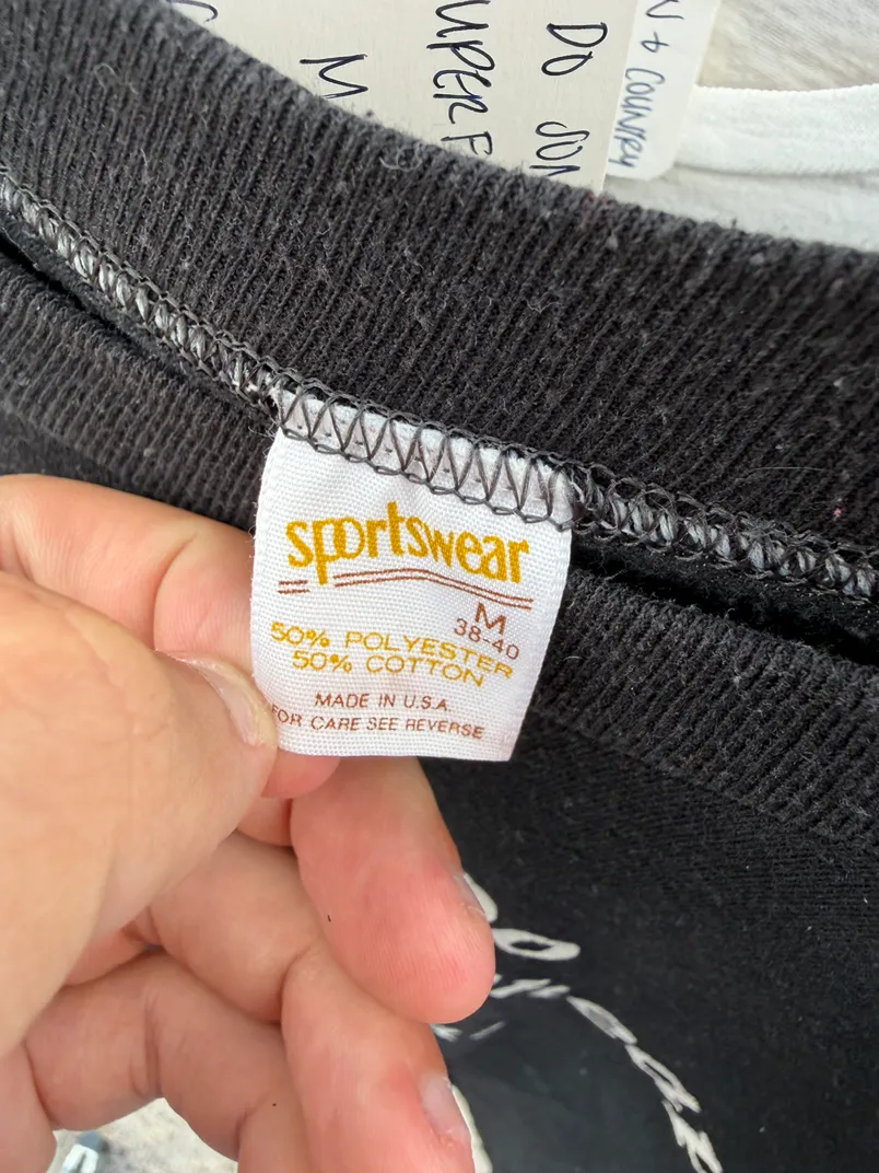 1980s cheap and superficial black tee