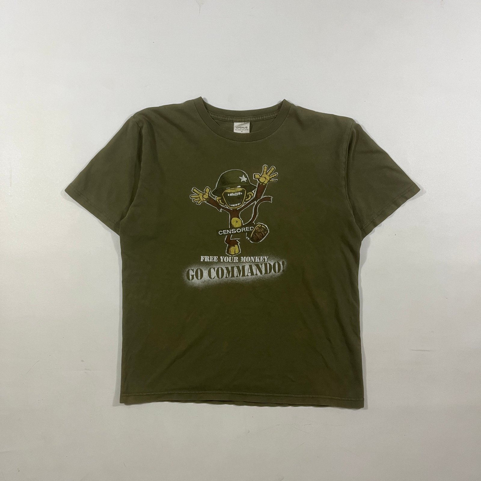 Y2K Cygnus "Free Your Monkey Go Commando" Olive Green Funny Graphic Tee M