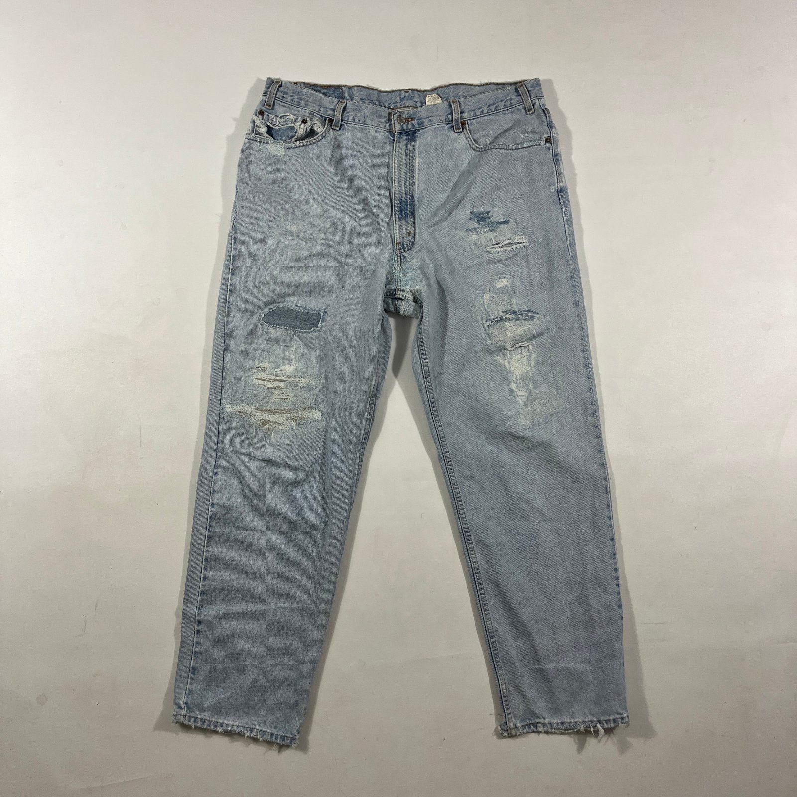 Vintage Levi's 550 Relaxed Fit Light Wash Thrashed Distressed Denim Jeans 42x32